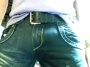 Pissing and bulging in taut jeans