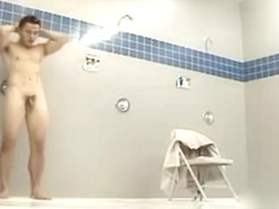 Muscular Asian marine takes a long shower