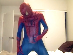 playing in Spiderman suit