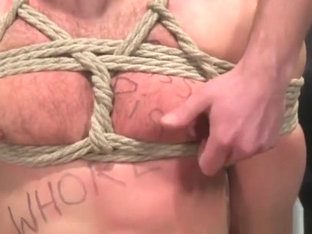 BDSM dom pisses into subs mask before jerking