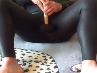 Hitting balls with rubber mallet in wetsuit