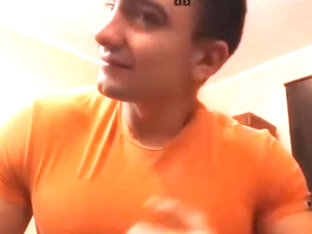 Muscular Young Bodybuilder in Tight Shirt